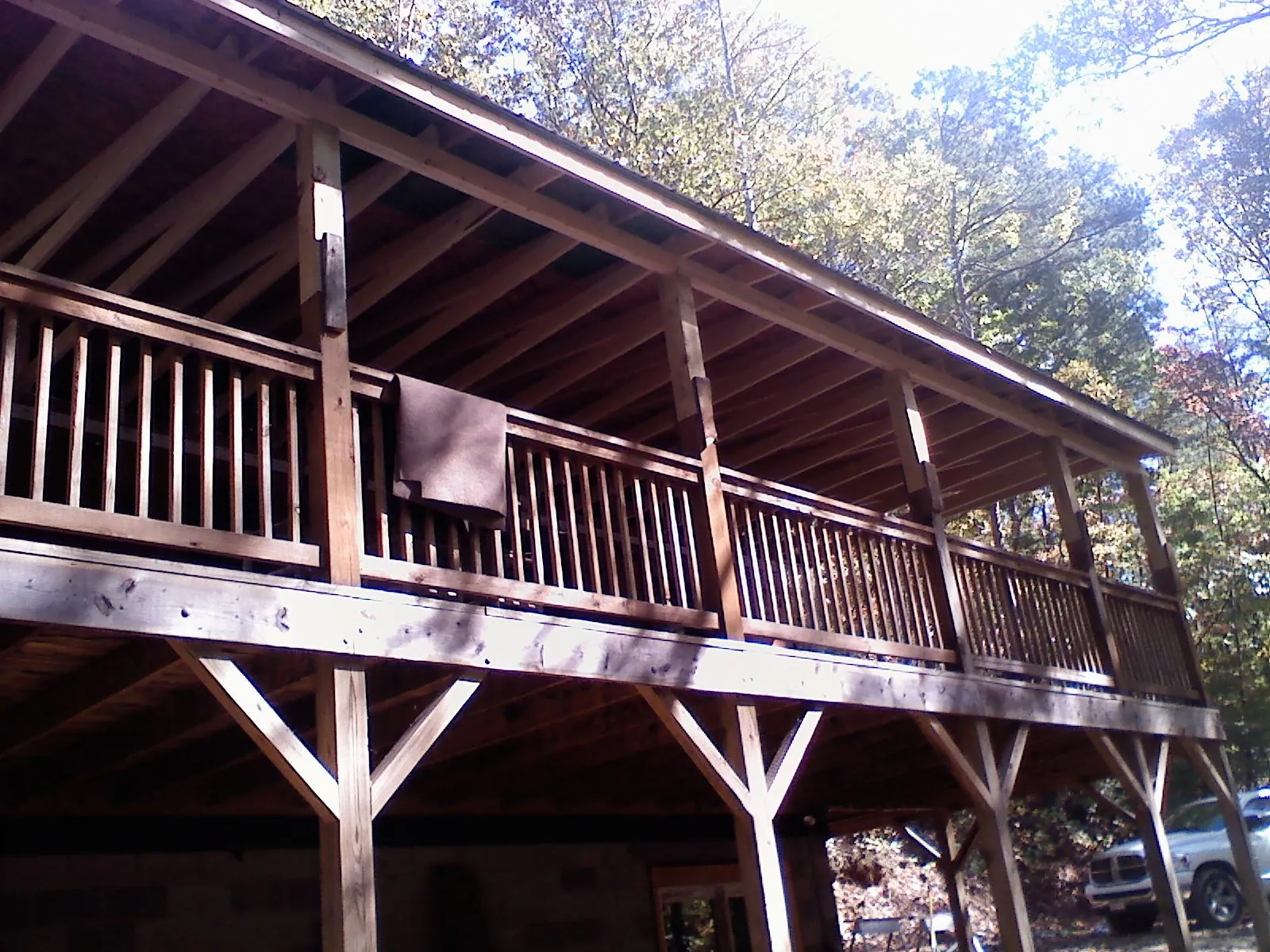 Timber framing under a new elevated porch and deck — Roof Leak Repair in Minotola by Roofing Brothers